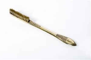 Silver toothbrush.